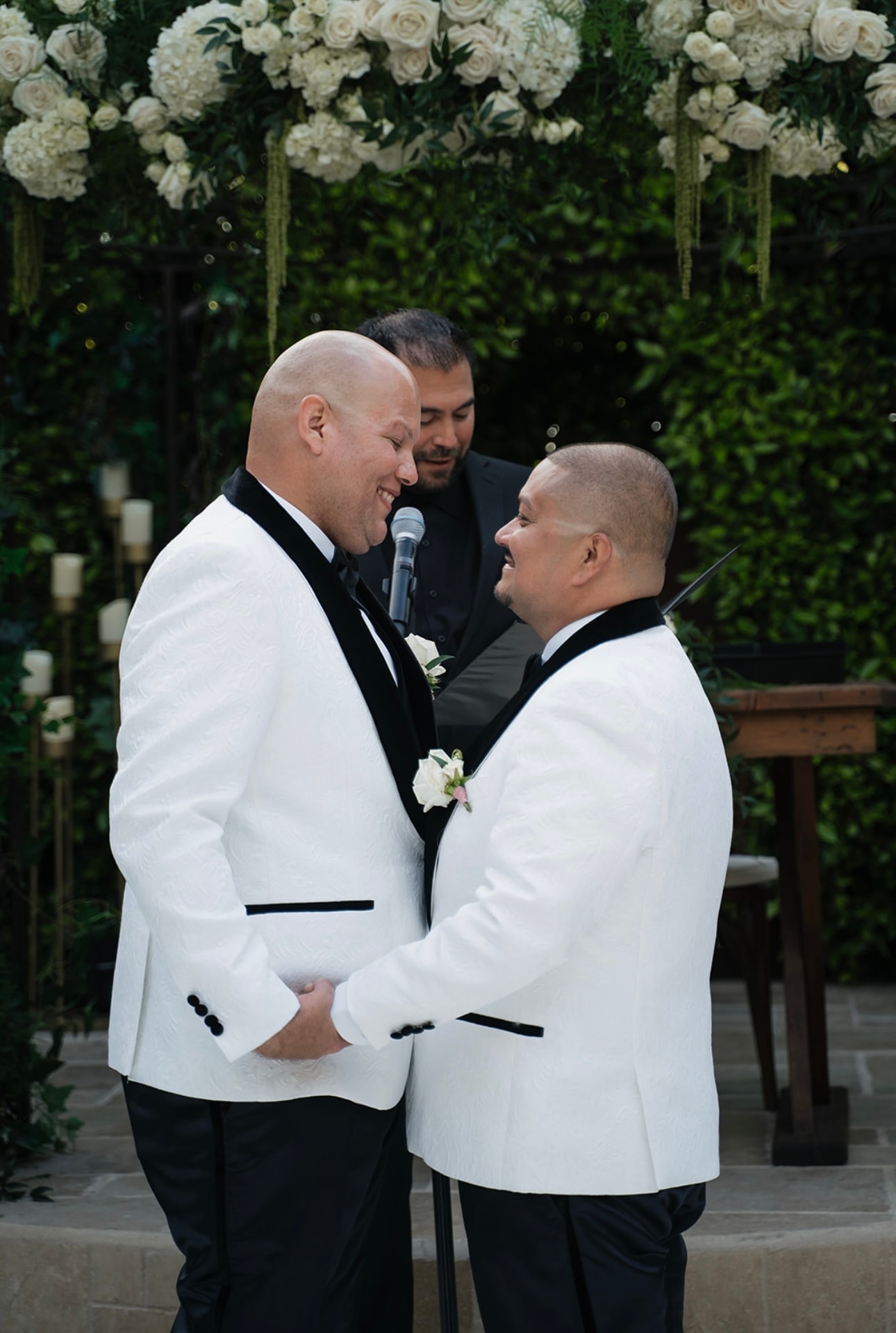 Eddie and Nelson exchanging vows at The Secret House of Ivy in Downey